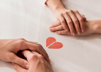 Two hands reaching out to each other.