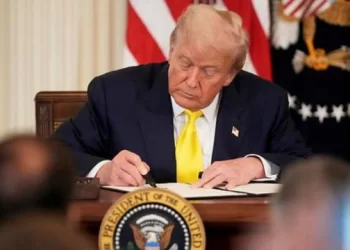 Image idea: US and India flags with shipping containers in the background