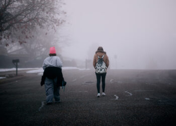 A person walking away peacefully from a toxic relationship