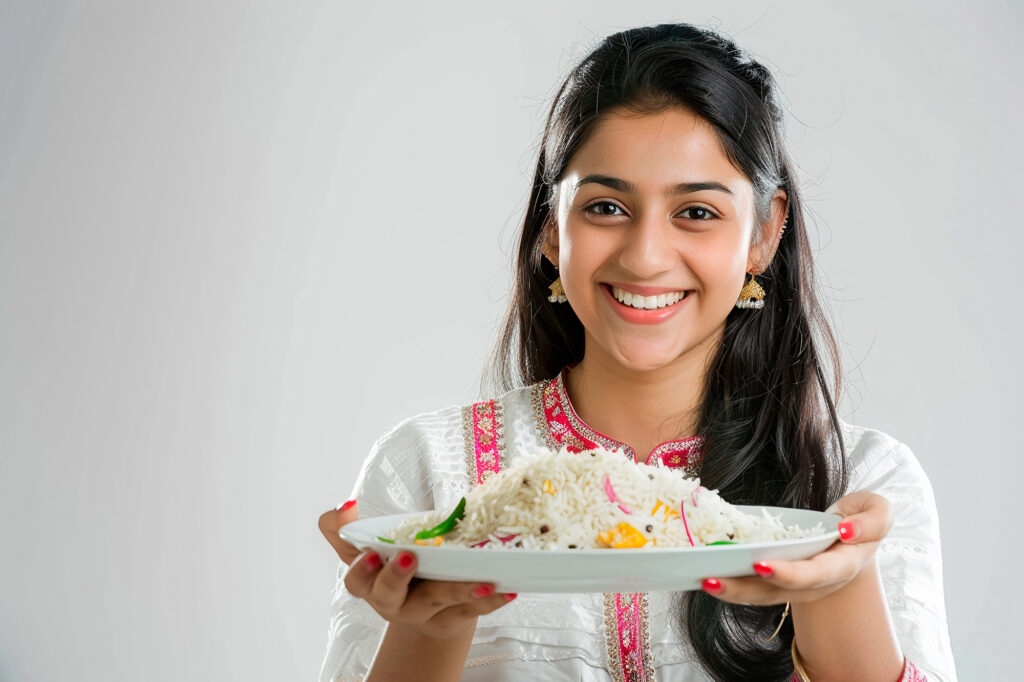 Healthy batch-cooked meals including quinoa bowls, baked chicken, dal, tomato pasta sauce, and overnight oats arranged for weekly meal prep
